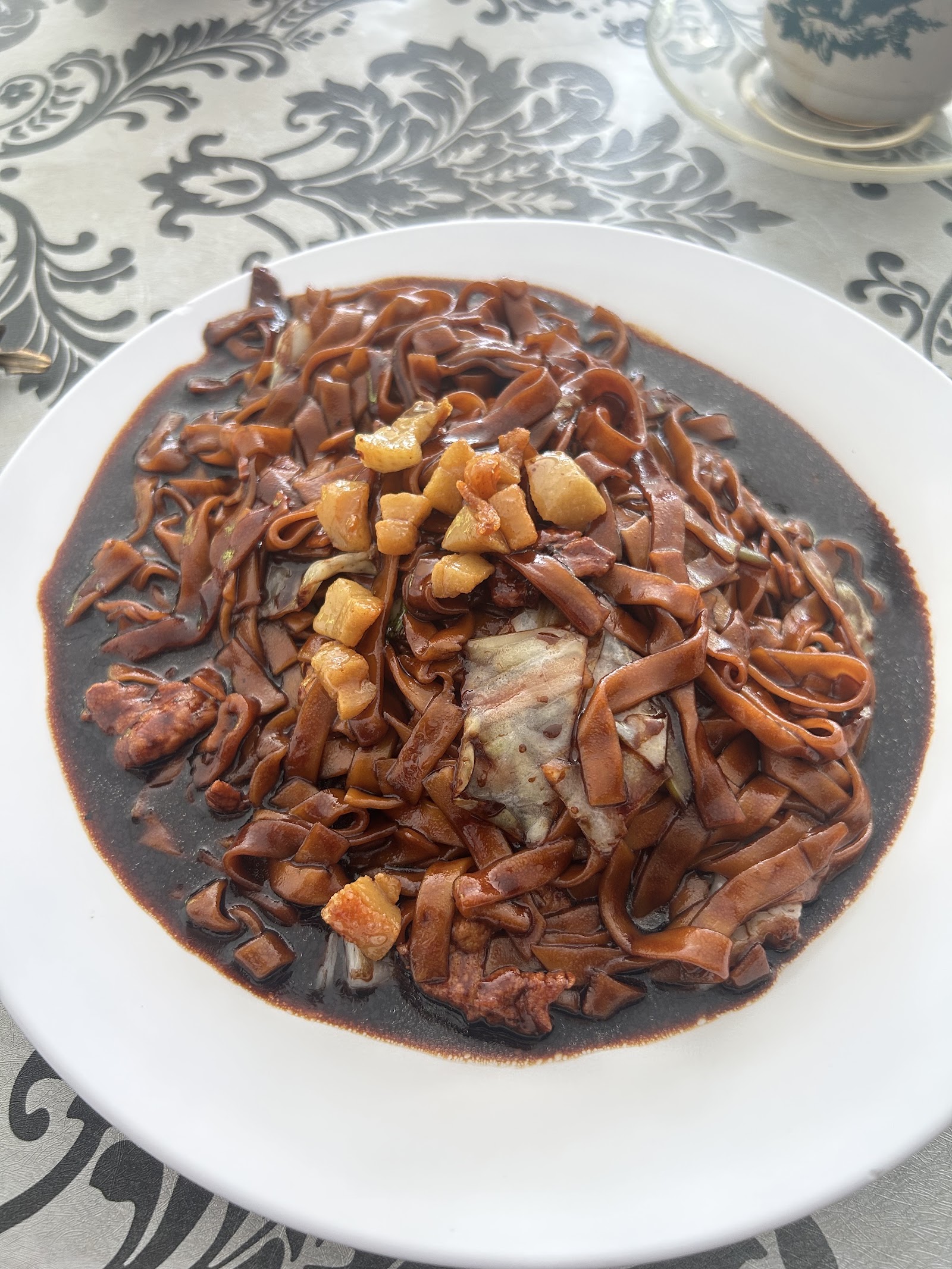 甲洞乌鲁炒板面